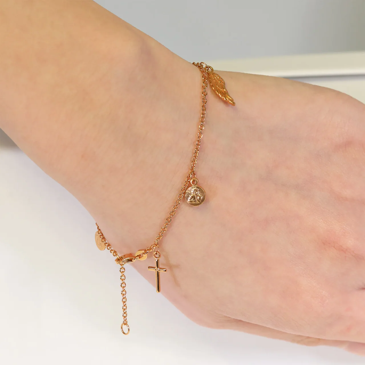 18ct rose gold cross, medallion and feather charm rosary bracelet - Image 2