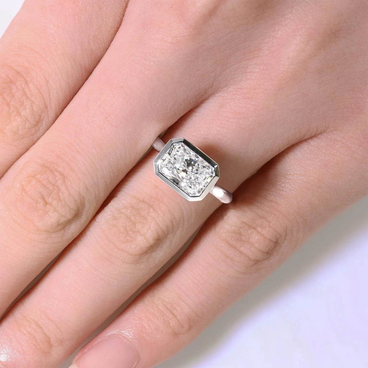 18ct white gold 1.94ct elongated radiant cut lab grown diamond bezel set solitaire engagement ring - Image 2