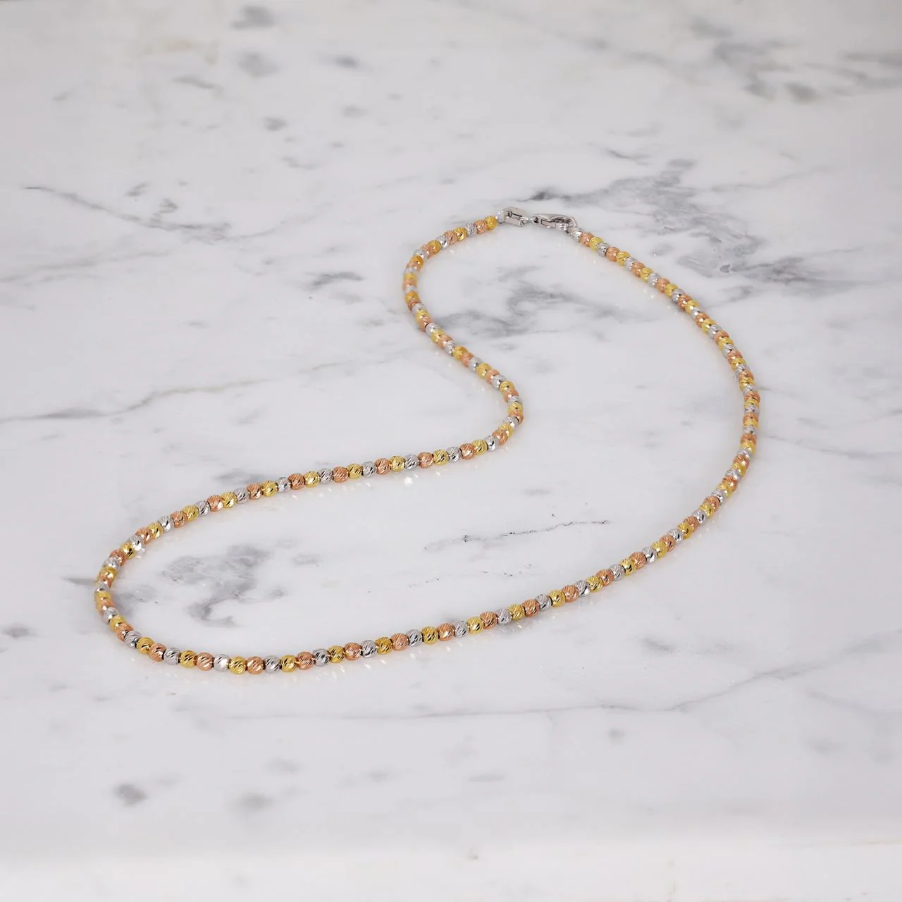 18ct white, yellow & rose gold ball necklace