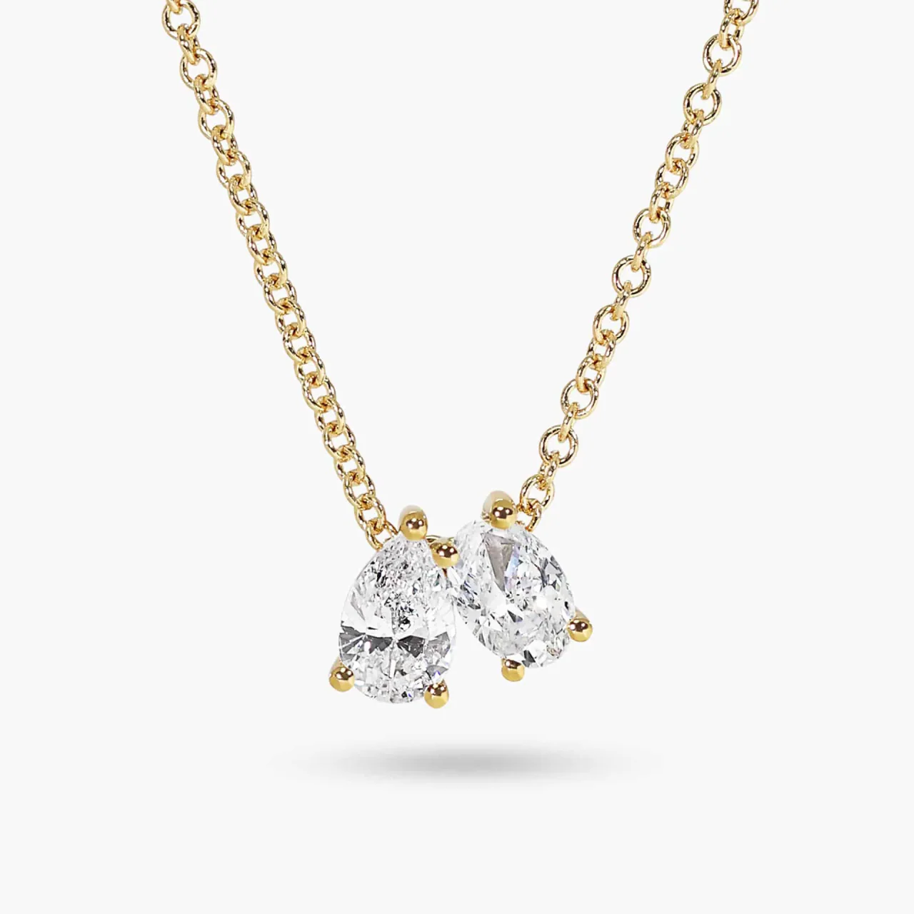 18ct yellow gold 0.23ct pear and 0.27ct oval cut diamond necklace on 45cm trace chain