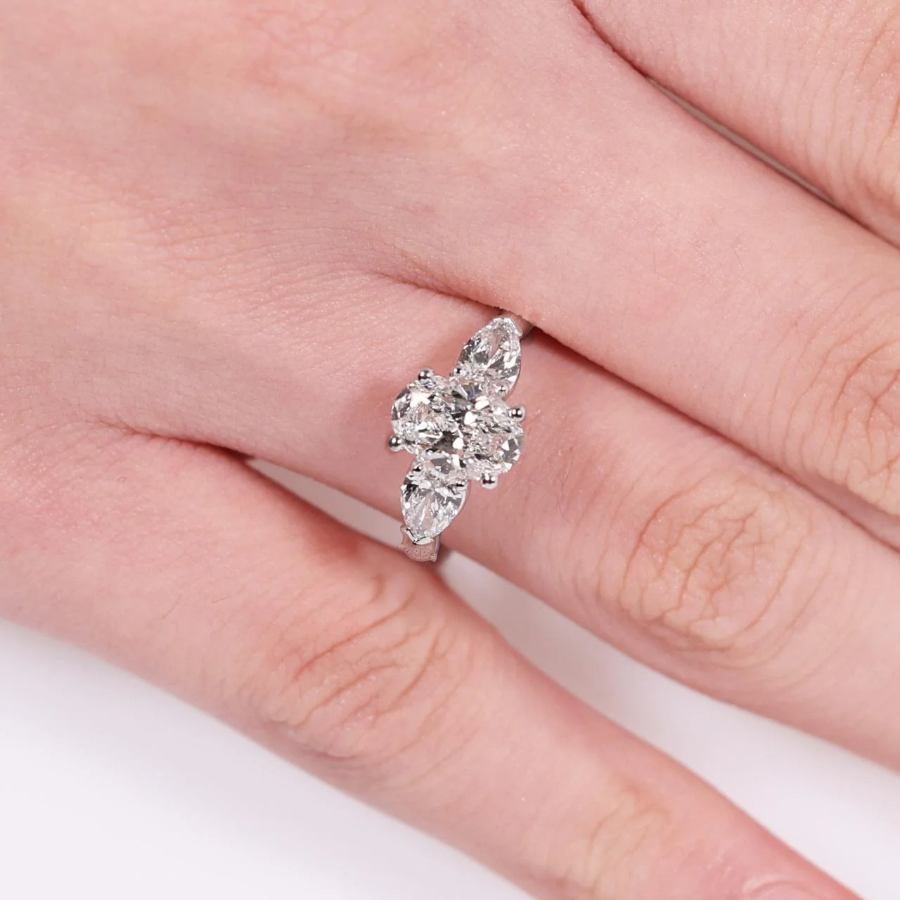 18ct white gold 1.20ct oval brilliant cut diamond and 2=0.60ct pear shaped diamonds engagement ring GIA Cert - Image 2