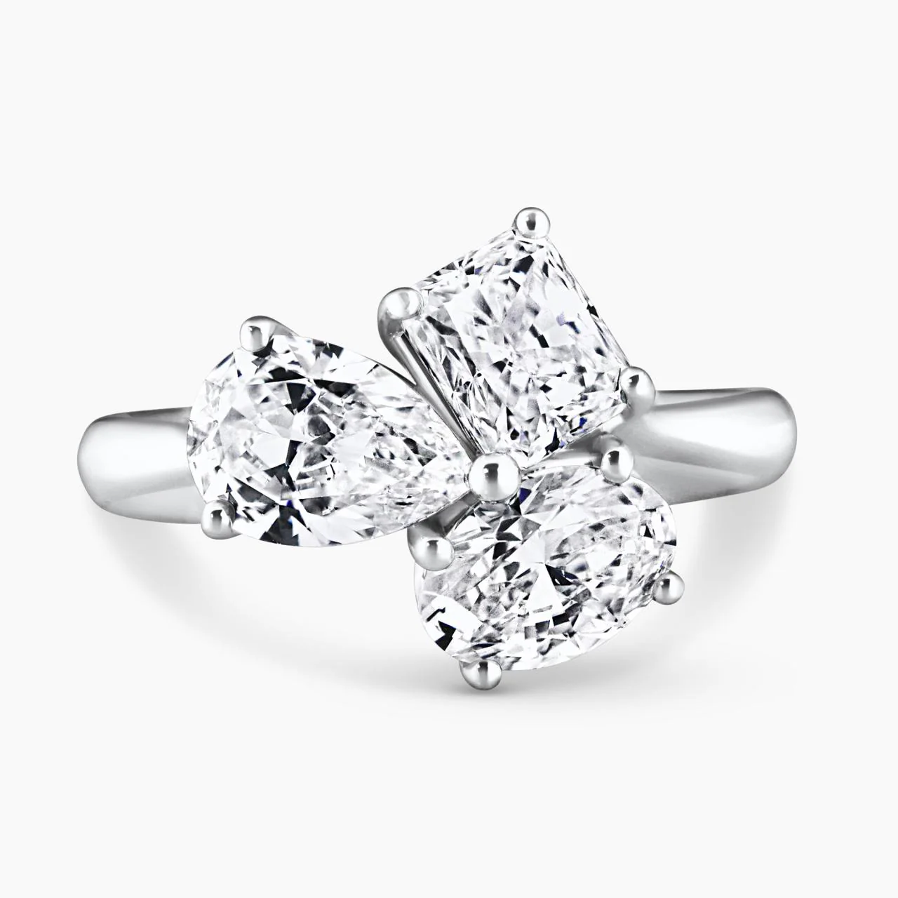 18ct white gold oval, pear and radiant diamond engagement ring