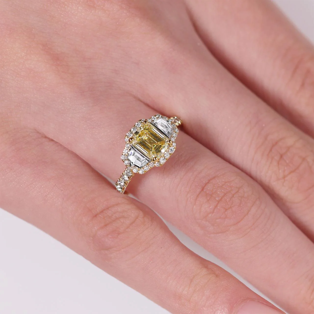 18ct yellow gold Fancy Intense Yellow emerald cut diamond engagement ring with cadillac step cut diamonds on the side - Image 4