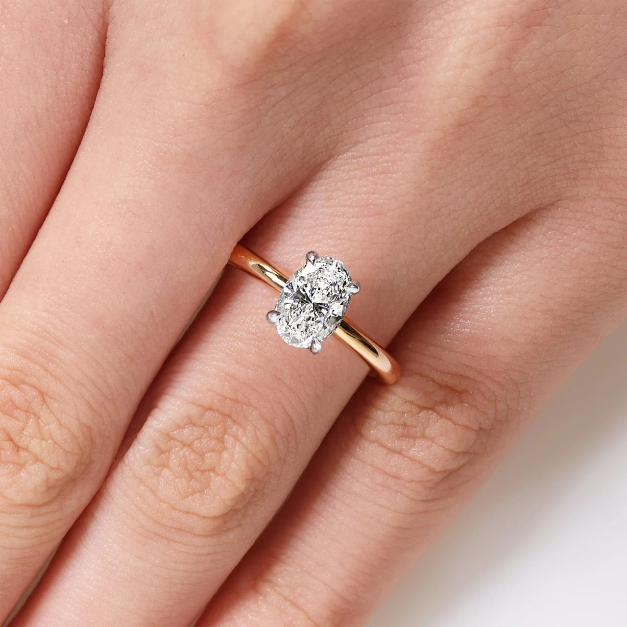 POSITANO DIA - 18ct rose and white gold 1.00ct GVS2 oval and round brilliant cut diamond hidden halo pinched band engagement ring - Image 3